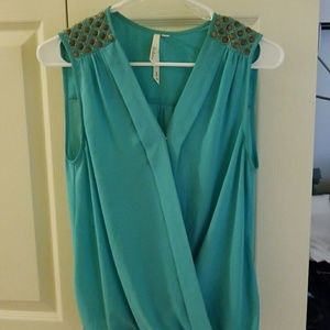 Teal sleeveless top with studded detail